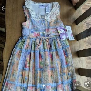 Two dresses, one never worn one only worn once